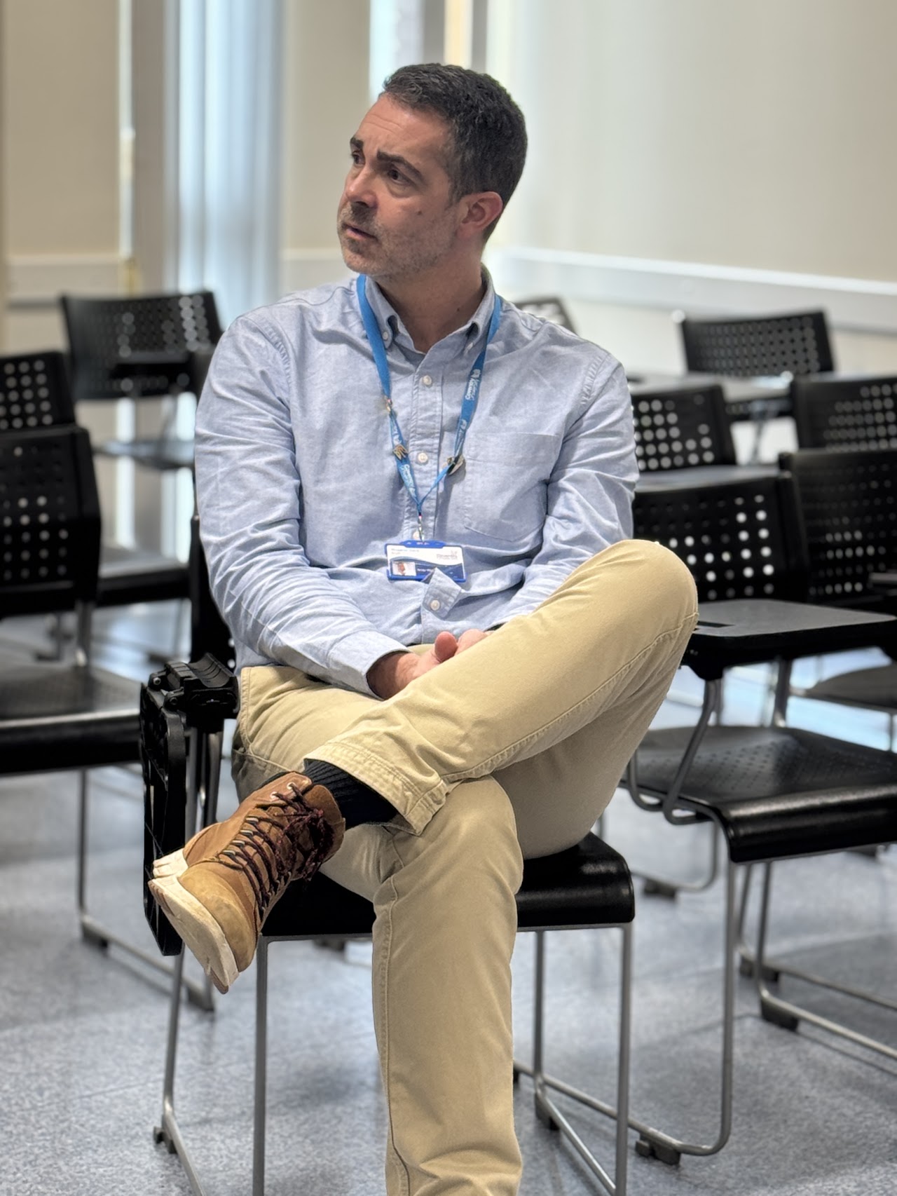 Andy Winter, Assistant Professor in Health Simulation at Coventry University, seated in the training room
